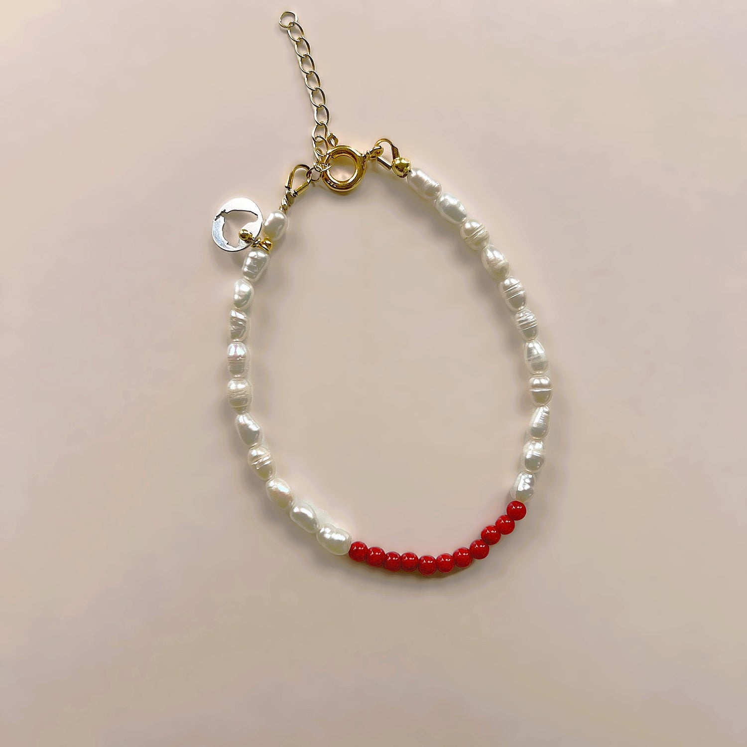 Armband Tender, met  koraal en parel