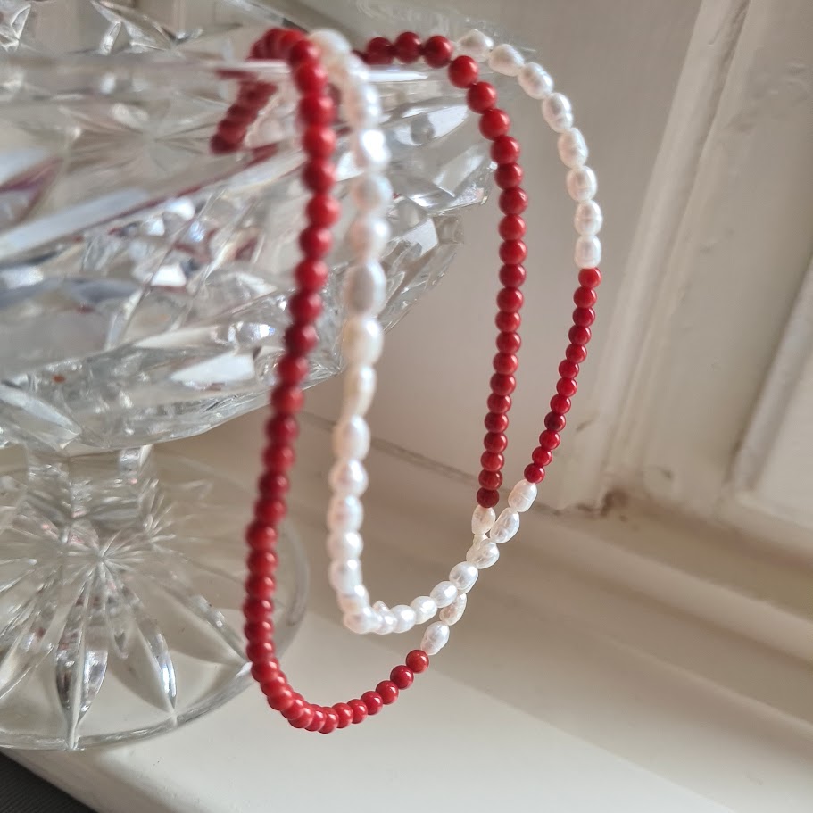 Ketting Tender, parel, koraal