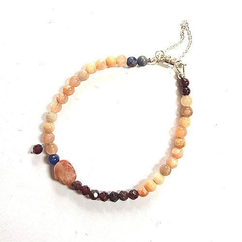 Armband Silent Lion, granaat, zonnesteen, lapis lazuli