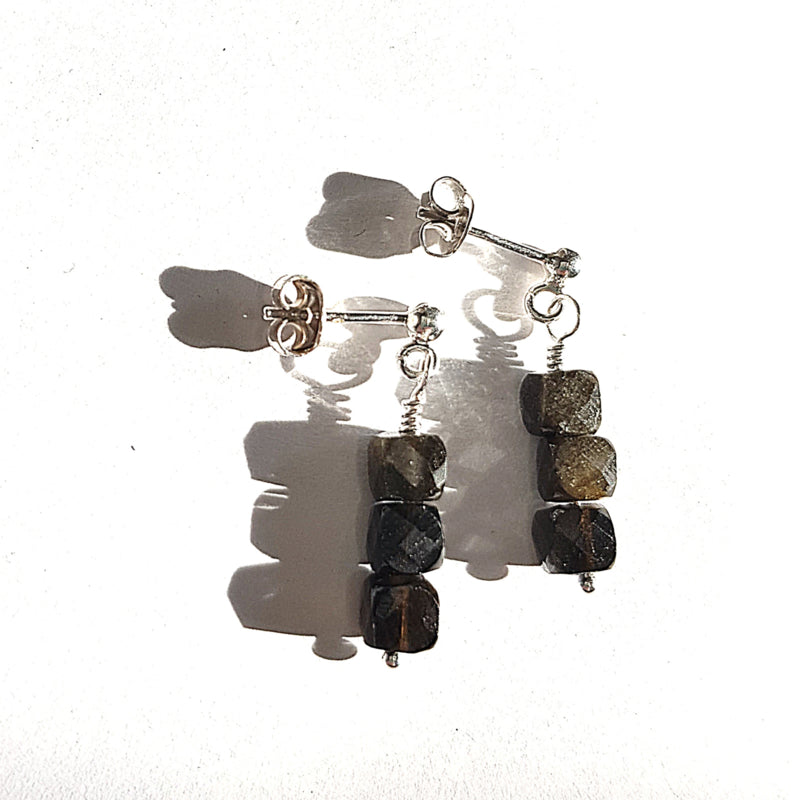 Oorstekers Insight, goud obsidiaan