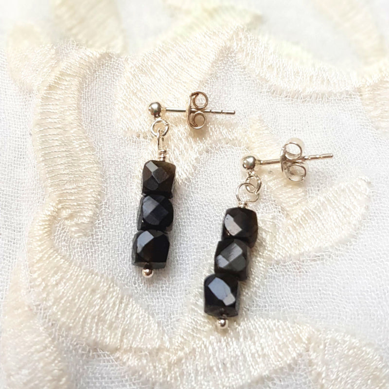Oorstekers Insight, goud obsidiaan